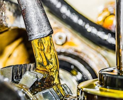 Lubricants and oils being applied to engine