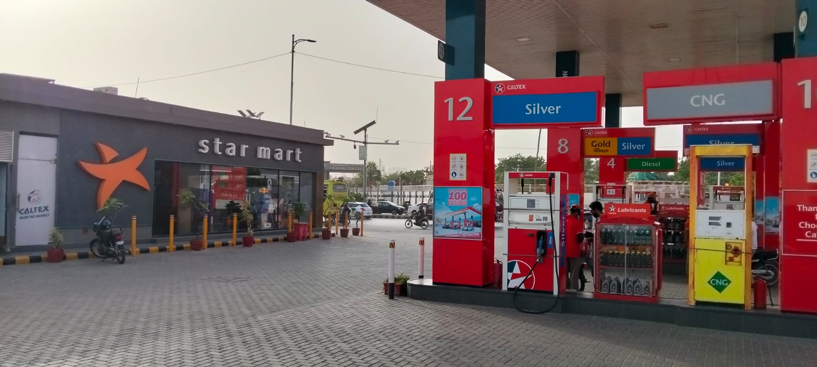 Maryam Taj Caltex pumps and Star Mart
